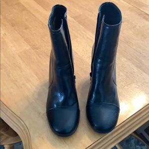 Above the ankle but not quite mid calf black boots